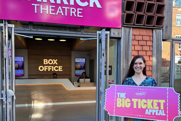 A lady with a big ticket