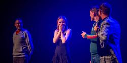 Four people on stage that were picked from the audience in a variety act