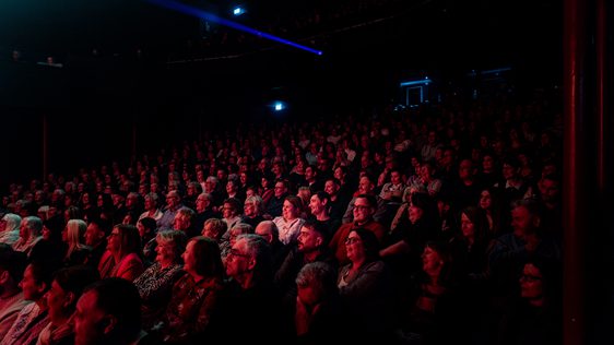 Audience members during a performance in the Main Auditorium