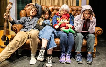 Bah Humbug show cast Photo on Sofa